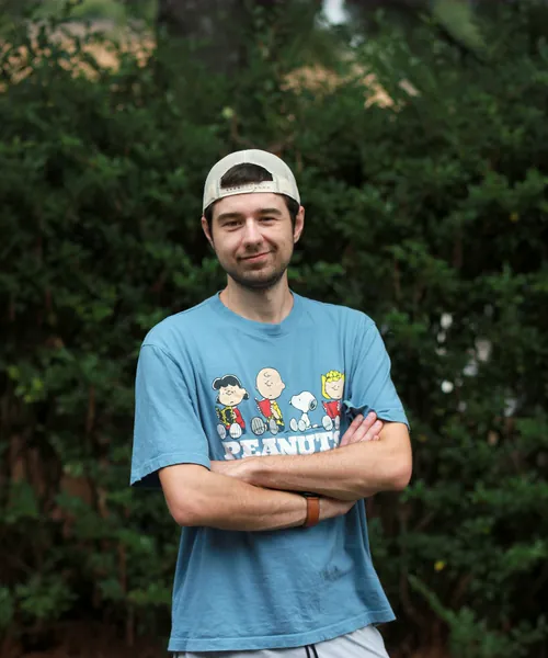 Mobility Concepts crew member in a blue T-shirt and cap